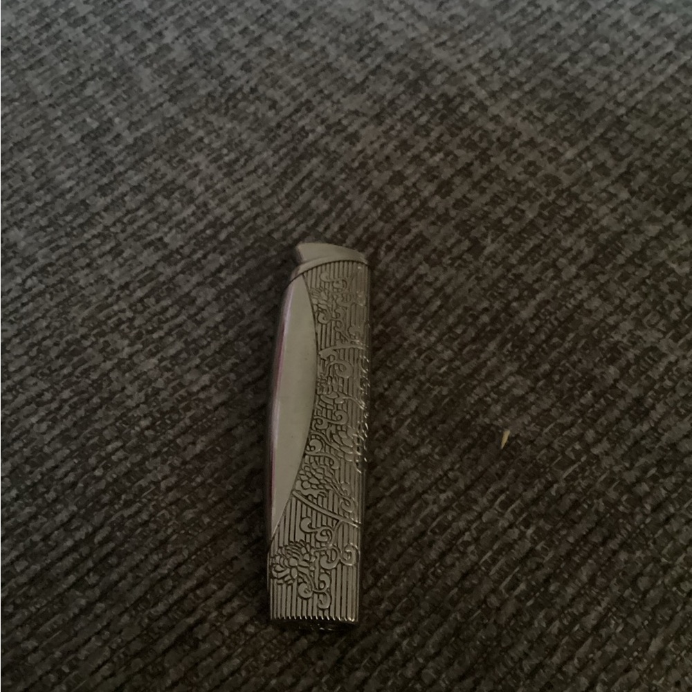 Vintage silver tone lighter